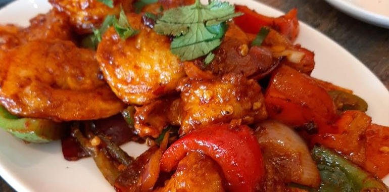 Which are the must-try Indian dishes to have at Chola’s Indian Restaurant?